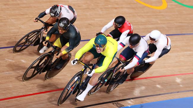 IZU, JAPAN - AUGUST 08: (L-R) Yuta Wakimoto of Team Japan, Mohd Azizulhasni Awang of Team Malaysia, Matthew Glaetzer of Team Australia, Kwesi Browne of Team Trinidad And Tobago, Denis Dmitriev of Team ROC and Stefan Boetticher of Team Germany sprint during the Men's Keirin quarterfinals - heat 3 of the track cycling on day sixteen of the Tokyo 2020 Olympic Games at Izu Velodrome on August 08, 2021 in Izu, Shizuoka, Japan. (Photo by Justin Setterfield/Getty Images)