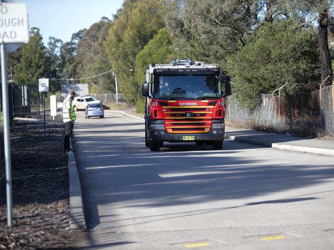 SYDNEY, AUSTRALIA - NCA NewsWire Photos -  06 JULY, 2023: A fire truck leaves the Villawood Detention Centre after a fire was extinguished on level two.Picture: NCA NewsWire / Christian Gilles