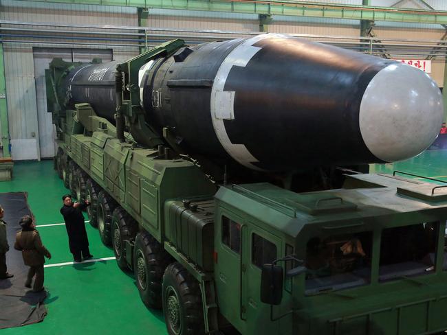 Check out the size of this … North Korean leader Kim Jong-un inspect the Hwasong-15 intercontinental ballistic missile. Picture: Korean Central News Agency/Korea News Service via AP