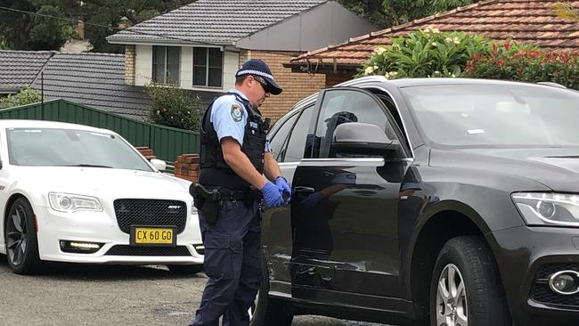 Police tow the allegedly stole Audi on Thursday morning. Picture: Madeline Crittenden
