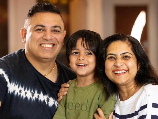 MELBOURNE, DECEMBER 19, 2022: Young mopther Rupika Chopra spent two months in ICU at The Alfred after developing a rare severe cardiac condition. After six weeks on life support, doctors made decision to turn off life support, but her husband Yogesh Malhotra prayed to Guruji for her to recover and return her to the family. Much to the surprise of doctors, the family's prayers were answered and Rupika is now home for Christmas. Rupika and Yogesh are pictured with their youngest child Royale Malhotra, 3. Picture: Mark Stewart