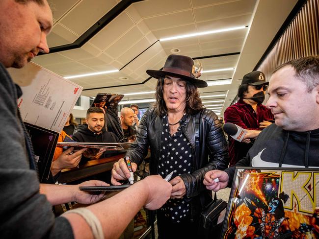 Paul Stanley signs autographs for fans upon arrival at Melbourne Airport to begin the Australian leg of the End of the Road Tour. Picture: Jake Nowakowski