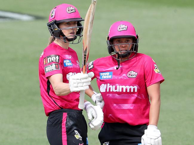 Perry (L) brought up her half-century but didn’t get enough help from her teammates in the top order. (Photo by Sarah Reed/Getty Images)