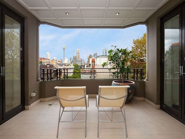 The Macleay St unit has views of Sydney harbour and the city.