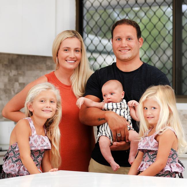 Titans five-eighth Tyrone Roberts with his wife Brittany and children Cash (10 Weeks), Leilani (6), and Chilli (3). Photo: Scott Powick Newscorp