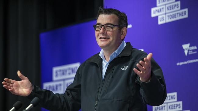 Victorian Premier Dan Andrews cracks a rare smile during Saturday’s daily update. Picture: Wayne Taylor