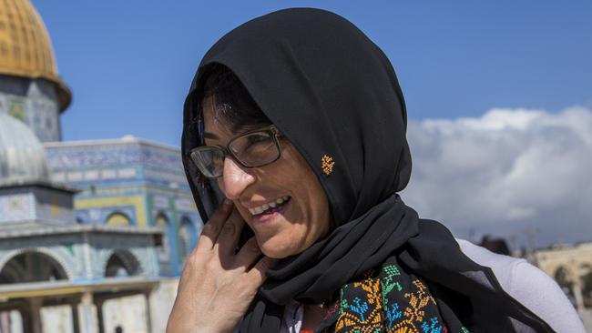 JERUSALEM, ISRAEL - JUNE 1:  Susan Abulhawa, a Palestinian-American writer and human rights activist, visits the Al Aqsa mosque whilst travelling with the 2014 Palestine Festival of Literature on June 1, 2014 in Jerusalem, Israel.  The festival is an annual event that aims to bring a cultural festival of international standard to audiences in Palestine to assert "the power of culture over the culture of power."  (Photo by Rob Stothard/Getty Images)