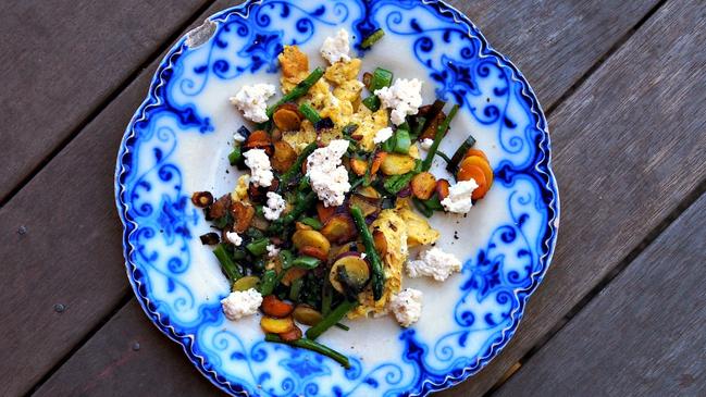 FRESH IS BEST: Scrambled eggs with fresh spring veggies and homemade cheese. Picture: Krista Bjorn