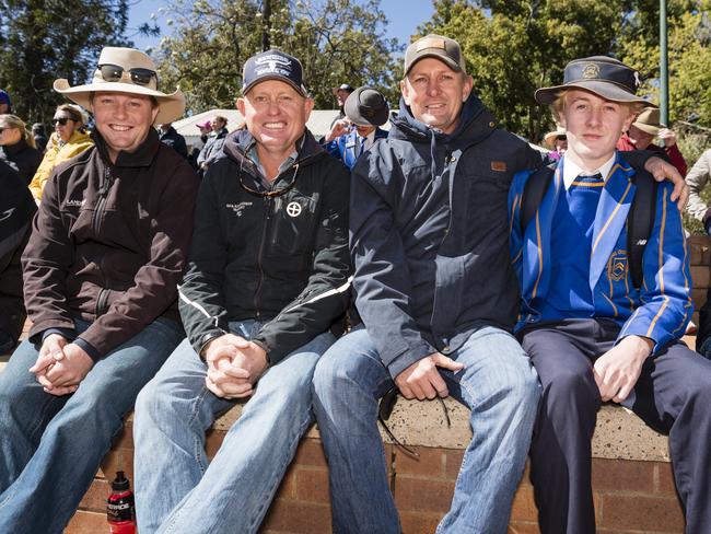 Watching the rugby are (from left) Jesse McCutcheon, Simon McCutcheon, Tim McInnerney and Dougal McInnerney on Grammar Downlands Day at Toowoomba Grammar School, Saturday, August 19, 2023. Picture: Kevin Farmer