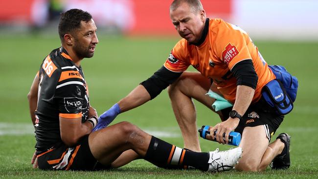 Benji Marshall failed to finish his last game for Wests Tigers after suffering a knee injury and broken ribs in a tackle. Picture: Getty Images