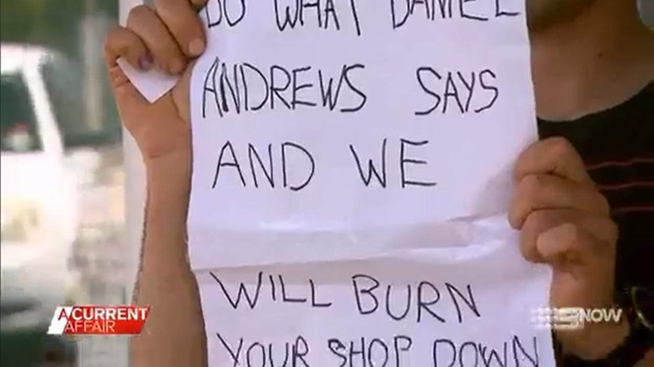 Symeon Kandias found this sign taped to his door. Picture: 9 News/ A Current Affair.