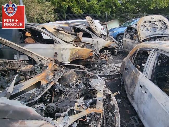 The damaged cars in a Sydney Airport carpark. Picture: Fire and Rescue NSW