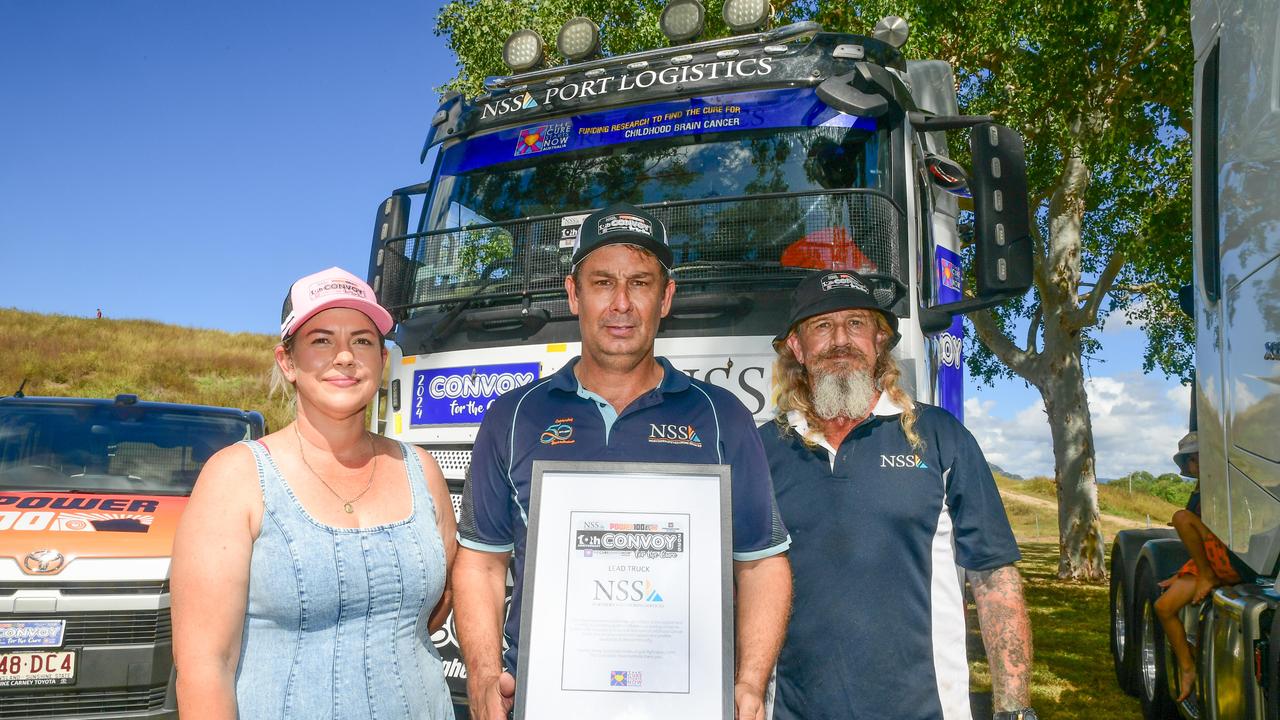 Kelly Norris, David Vass and Darrin Skinny of Northern Stevedoring Services. The country’s second largest industry, transportation, made a strong statement in support of the fight against childhood cancer during The Convoy for the Cure in Townsville on Sunday. Picture: Scott Radford-Chisholm