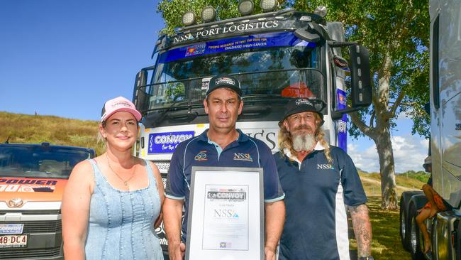 Kelly Norris, David Vass and Darrin Skinny of Northern Stevedoring Services. The country’s second largest industry, transportation, made a strong statement in support of the fight against childhood cancer during The Convoy for the Cure in Townsville on Sunday. Picture: Scott Radford-Chisholm