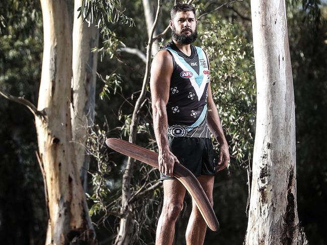 AFL - Port Adelaide Ruckman Paddy Ryder with a boomerang that will be part of an exchange of gifts for Indigenous Round. Picture SARAH REED