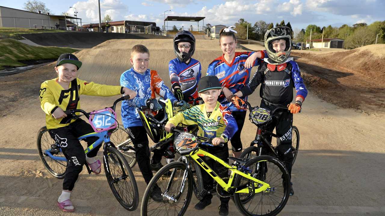 READY TO RIDE: Toowoomba BMX Club members (from left) Deanna Kampf, Travis Lord, Bodhi Hart, Maddie Groves, Andrew Burke and (front) Braxton Behrendt are busy preparing for the Queensland BMX titles in Brisbane next week. Picture: Kevin Farmer