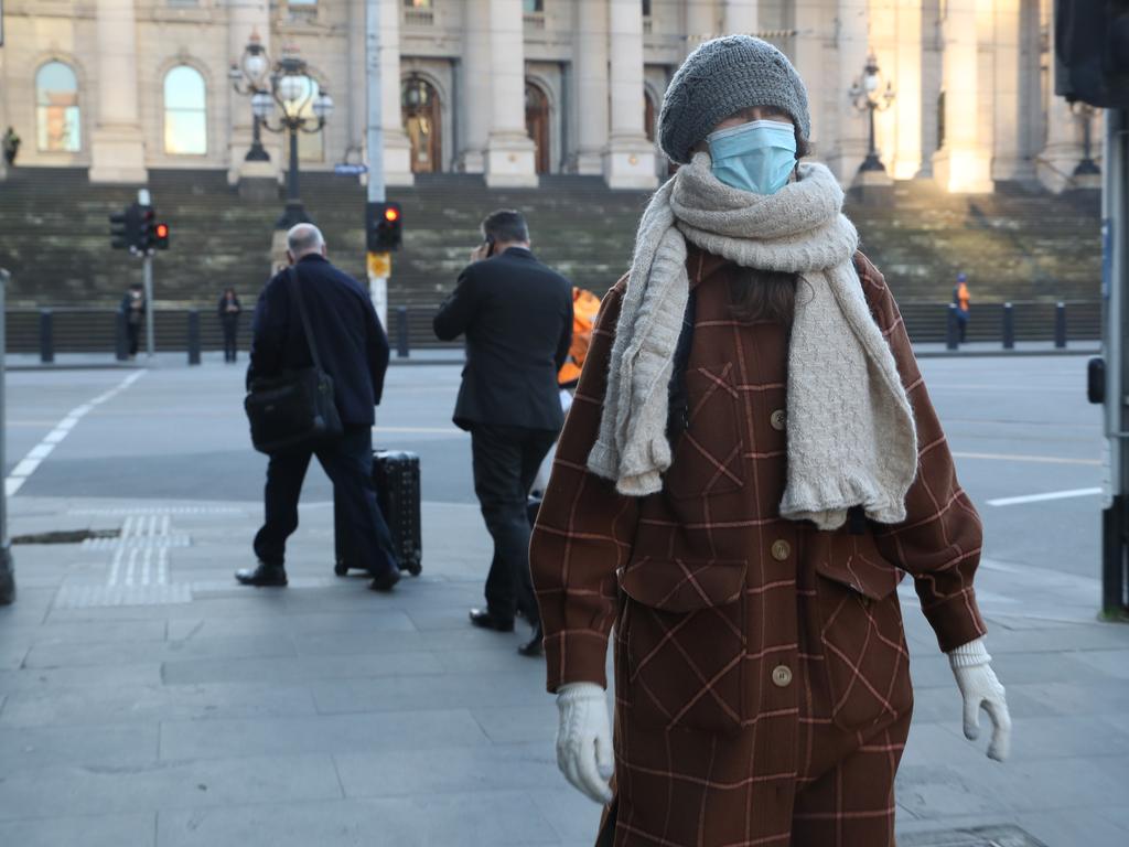 Melbourne has its coldest day of the year. People rug up in the CBD. Picture: NCA NewsWire / David Crosling