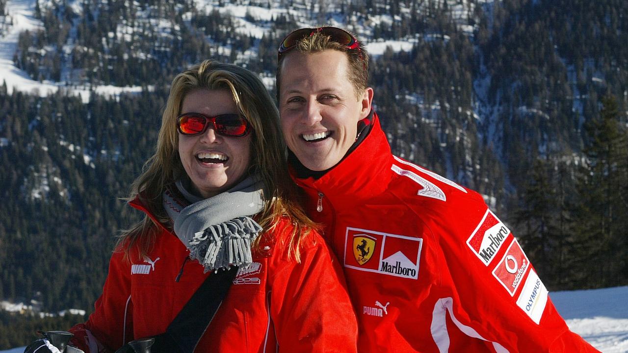 German Formula 1 driver Michael Schumacher poses with his wife Corinna, in the winter resort of Madonna di Campiglio, in the Dolomites area, Northern Italy, 11 January 2005.