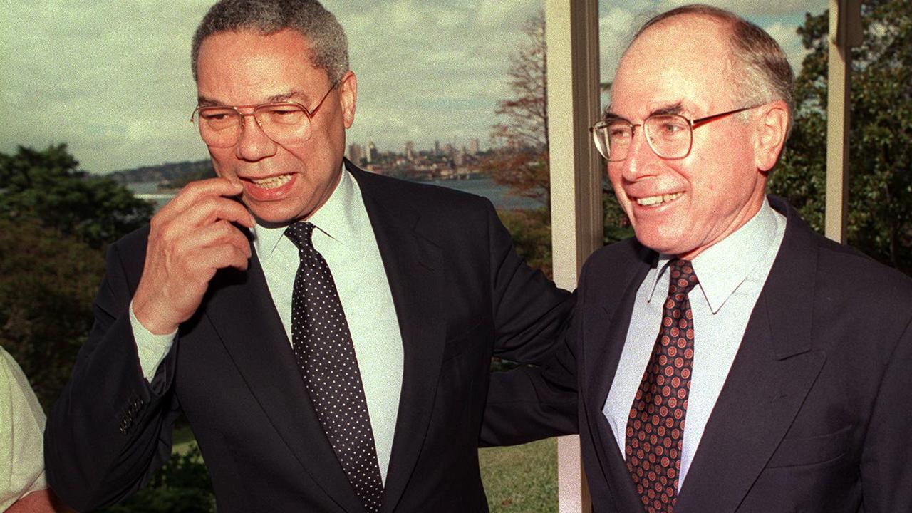 US General Colin Powell (L) meeting with then Australian Prime Minister John Howard at Kirribilli House, Sydney.