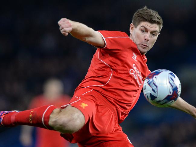 Liverpool's English midfielder Steven Gerrard volleys the ball during the English League Cup semi-final second leg football match between Chelsea and Liverpool at Stamford Bridge in London on January 27, 2015. Chelsea won 1-0, going through to the final 2-1 on aggregate. AFP PHOTO / GLYN KIRK RESTRICTED TO EDITORIAL USE. No use with unauthorized audio, video, data, fixture lists, club/league logos or “live” services. Online in-match use limited to 45 images, no video emulation. No use in betting, games or single club/league/player publications.