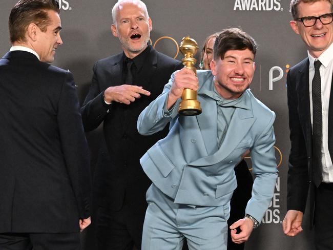 Colin Farrell, director Martin McDonagh and actor Barry Keoghan pose with their Golden Globe for The Banshees of Inisherin. Picture: AFP