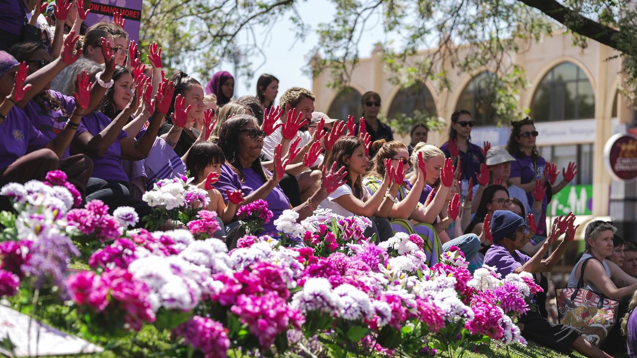 The 200-strong crowd outside Alice Springs Court House joined a Territory-wide day of action in Tuesday calling for domestic violence funding reform.