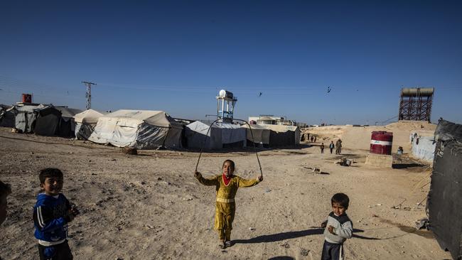 A picture shows the Kurdish-run al-Hol camp, which holds relatives of suspected Islamic State group fighters in the northeastern Hasakeh governorate, on December 6, 2021. (Photo by Delil Souleiman/AFP)