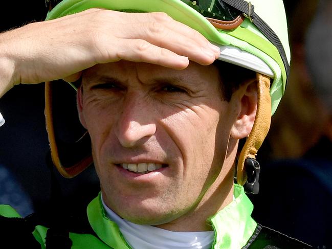 Jockey Hugh Bowman prior to riding Olympic Academy to win race 4, the TAB.COM.AU Handicap during the Warwick Farm Race Day at Warwick Farm Race Course in Sydney, Monday, October 2, 2017. (AAP Image/Brendan Esposito) NO ARCHIVING, EDITORIAL USE ONLY