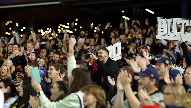 Crows fans celebrate the win during the AFL Gather Round match between Adelaide and Carlton. Picture: Phil Hillyard