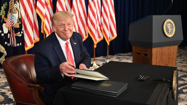 Donald Trump signs executive orders extending coronavirus economic relief. Picture; AFP.