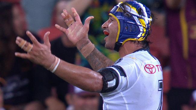 Johnathan Thurston reacts to the comedic finish.