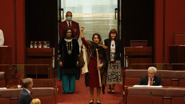 Lidia Thorpe shows the black power fist before being sworn in as the new Greens senator for Victoria, at Parliament House in Canberra. Thorpe replaces Richard Di Natale. Picture by Sean Davey.