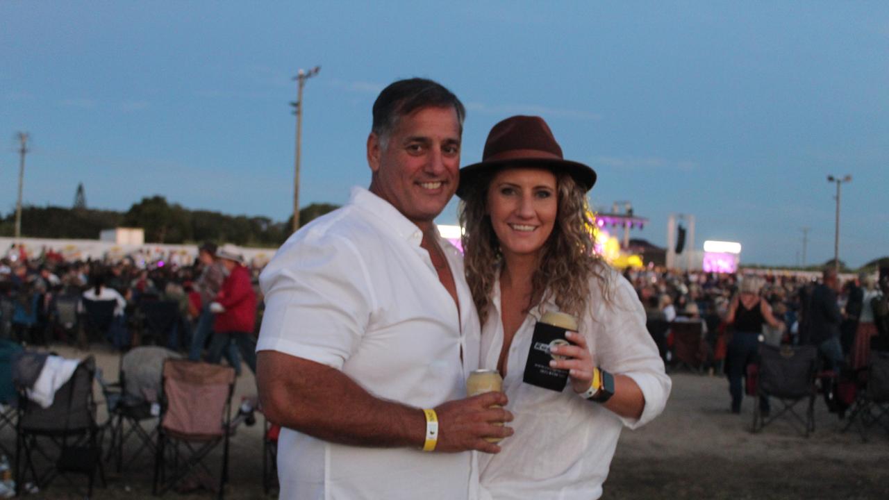 SOUNDS OF ROCK: Guy Barbera and Katey Mahoney enjoying the festival in Burnett Heads.