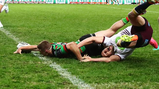 The bunker denies Joe Burgess a potential match-winning try. Picture: Brett Costello