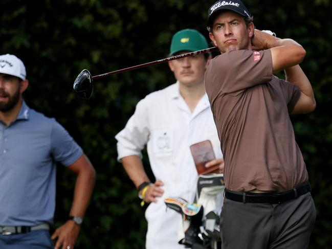 AUGUSTA, GEORGIA - NOVEMBER 09: Adam Scott of Australia plays his shot from the second tee as Erik van Rooyen of South Africa looks on during a practice round prior to the Masters at Augusta National Golf Club on November 09, 2020 in Augusta, Georgia.   Rob Carr/Getty Images/AFP == FOR NEWSPAPERS, INTERNET, TELCOS & TELEVISION USE ONLY ==