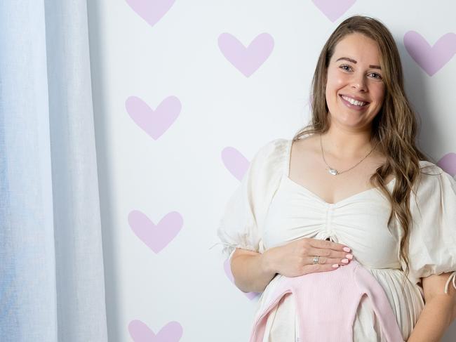 Influencer and single mum Caitlin Bailey, is pregnant with her fourth child. She had to travel  overseas to select their gender which is not currently legal in Australia. Pictured at her home in the Northern suburbs of Melbourne. Picture: Jason Edwards