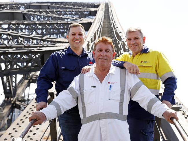 DAILY TELEGRAPH. MARCH 15, 2022.Pictured on the Sydney Harbour Bridge today is the Cerovac family, brothers Joseph and Goran, and father Mirko, who have all worked together on the bridge for 20+ years. Picture: Tim Hunter.