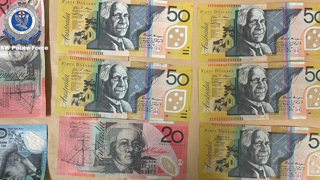 Wads of cash were seized in the ‘little shop of horrors’.
