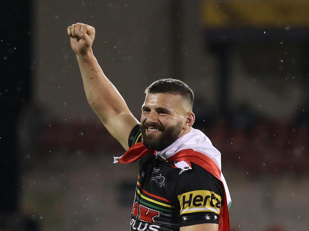 Josh Mansour with the Lebanon flag around his neck.