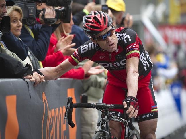 A spent Cadel Evans after finishing the 211km 12th stage of the Tour in 2011. Picture: AFP