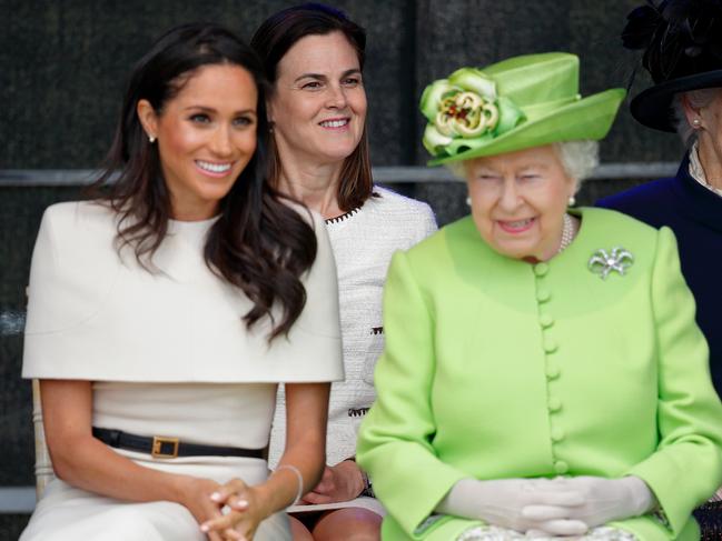WIDNES, UNITED KINGDOM - JUNE 14: (EMBARGOED FOR PUBLICATION IN UK NEWSPAPERS UNTIL 24 HOURS AFTER CREATE DATE AND TIME) Meghan, Duchess of Sussex and Queen Elizabeth II (accompanied by Samantha Cohen) attend a ceremony to open the new Mersey Gateway Bridge on June 14, 2018 in Widnes, England. Meghan Markle married Prince Harry last month to become The Duchess of Sussex and this is her first engagement with the Queen. During the visit the pair will open a road bridge in Widnes and visit The Storyhouse and Town Hall in Chester. (Photo by Max Mumby/Indigo/Getty Images)