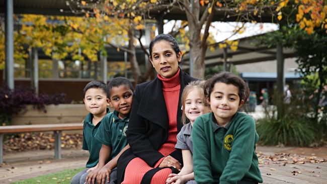 (L-R) Liam Chua (5), Hassan Saad (6), Principal Manisha Gazula, Ana Milanko (6) and Dena Saad (6) pose for a picture at Marsden Road Public School, Liverpool on the 20th of June 2019. Photographer: Adam Yip