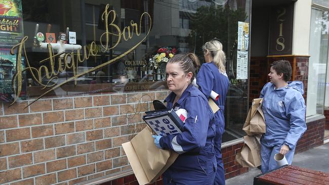 Police outside Antique Bar in Elsternwick where Mr Boursine died. Picture: Ian Currie