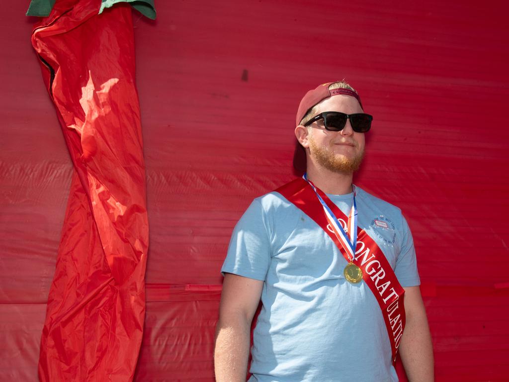 Andrew Hindmarsh, winner of the Chilli Dog Championship at the Murphys Creek Chilli and Craft carnival. Sunday, September 22, 2024. Picture: Nev Madsen