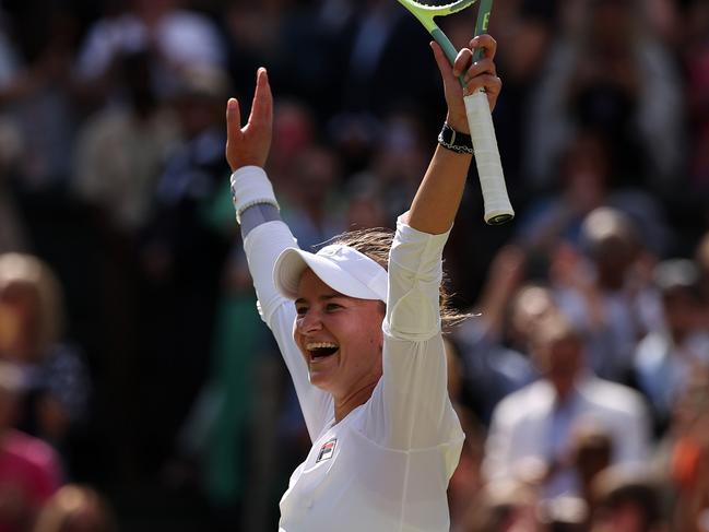 LONDON, ENGLAND - JULY 13: Barbora Krejcikova of Czechia celebrates winning Championship point against Jasmine Paolini of Italy during her Ladies' Singles Final match during day thirteen of The Championships Wimbledon 2024 at All England Lawn Tennis and Croquet Club on July 13, 2024 in London, England. (Photo by Julian Finney/Getty Images)