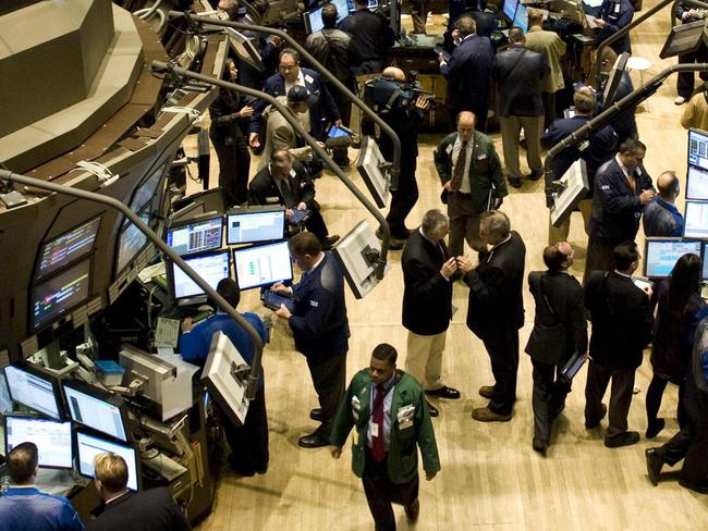 Trading on the floor of the New York Stock Exchange October 28, 2008 in New York. Wall Street rallied at the open Tuesday as global stock markets rebounded strongly from heavy losses a day earlier on hopes for fresh cuts in interest rates and an easing of the credit crisis. The Dow Jones Industrial Average jumped 210.03 points (2.57 percent) to 8,385.80 in the first 10 minutes after Monday's late sell-off that pushed blue chips down more than 200 points. AFP PHOTO/DON EMMERT