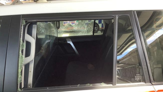 A 22-year-old Garbutt man has been charged after he allegedly threw rocks at a police vehicle.