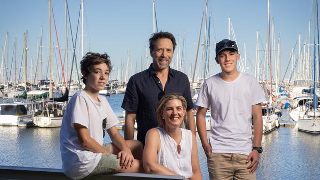 Sarah Tebbutt, 49, and Sergio Zaccaria, 59, relocated from Melbourne to Queensland’s Manly with their boys, Oliver, 15, and Sebastian, 14, three years ago. Picture: David Kelly