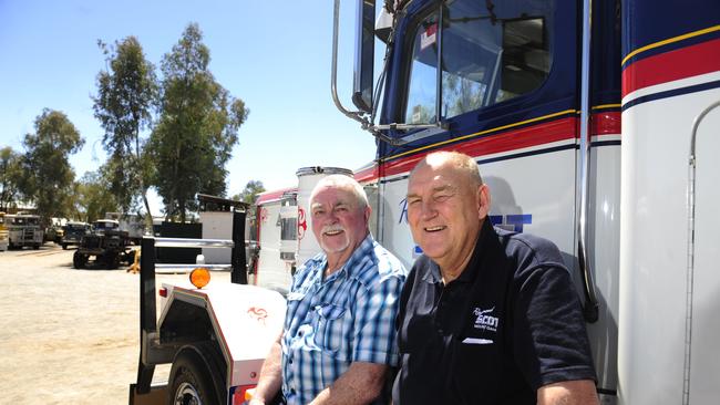 2014: Scott with truckie Ted Bushby, reunited at the Road Transport Hall of Fame after having not seen each other for 30 years. Pictured in front of one of Ray’s old trucks, which was used to cart fuel from Darwin between 1978-97. Picture Justin Brierty