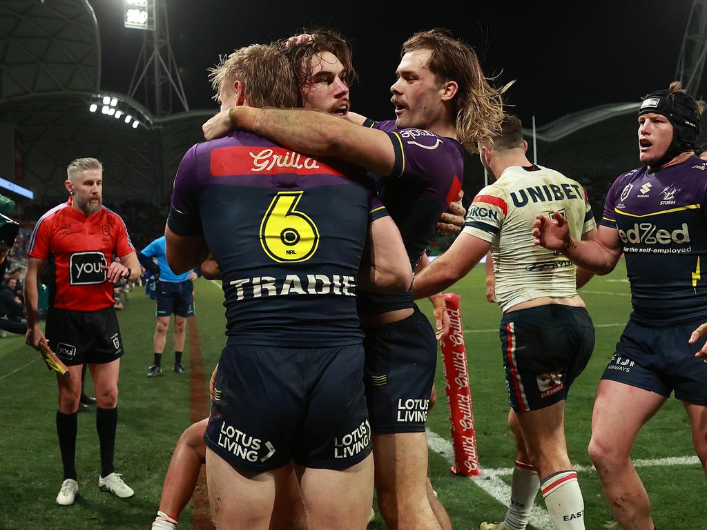 Grant Anderson of the Storm celebrates with Ryan Papenhuyzen of the Storm after making a try saving tackle against Dominic Young. Picture: Getty Images